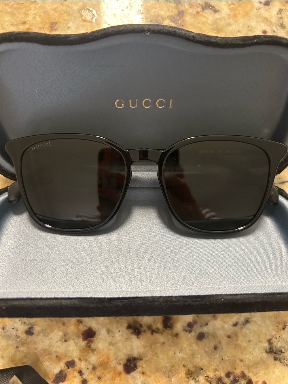 Gucci Men’s Black Frame Sunglasses with Dark Lenses